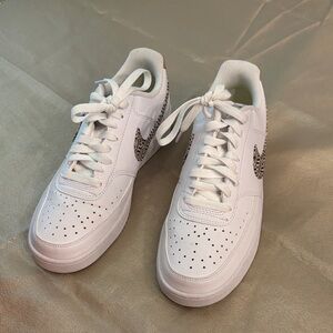 Nike White Sneakers with Patterned Swoosh